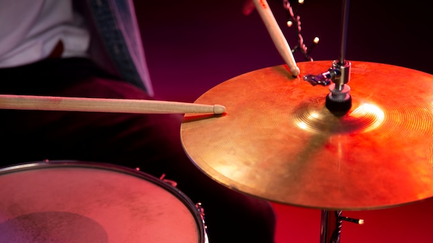 Close up drummer holding sticks