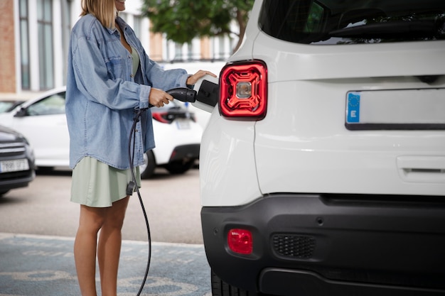 Close up on electric car charging