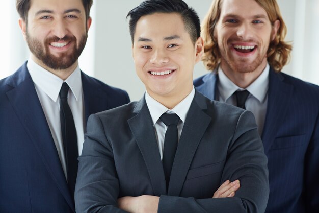 Close-up of employees having fun at work