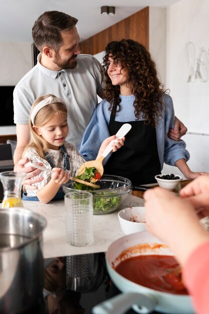 Close up on family enjoying food together