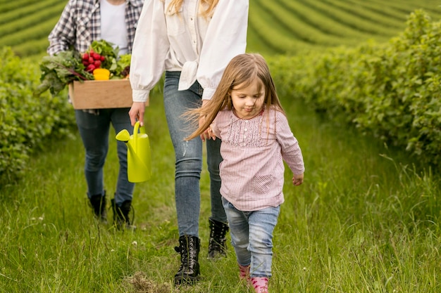 Free photo close-up family at farmland