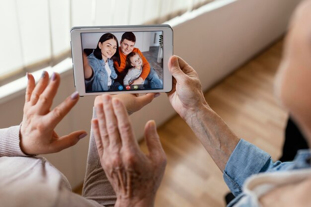 Close up family videocall concept