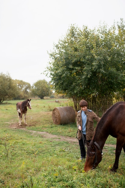 Close up on farmer with beautiful horse