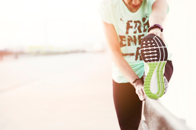 Close-up of a female athlete stretching