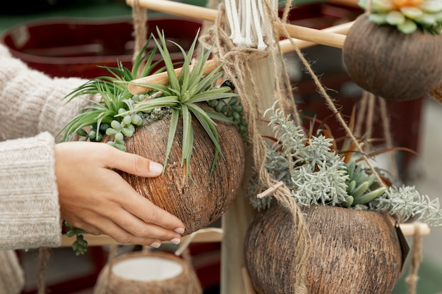 Free Photo close-up florist making cute arrangements