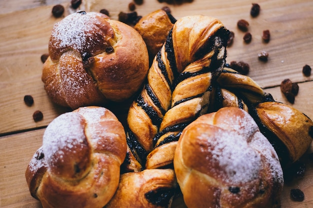 Free Photo close-up fresh buns and raisins