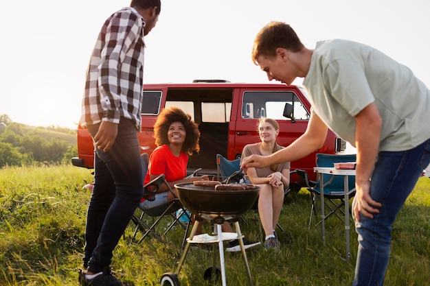 Free Photo close up friends making barbecue