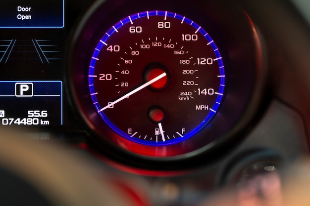 Close up on fuel level gauge in vehicle