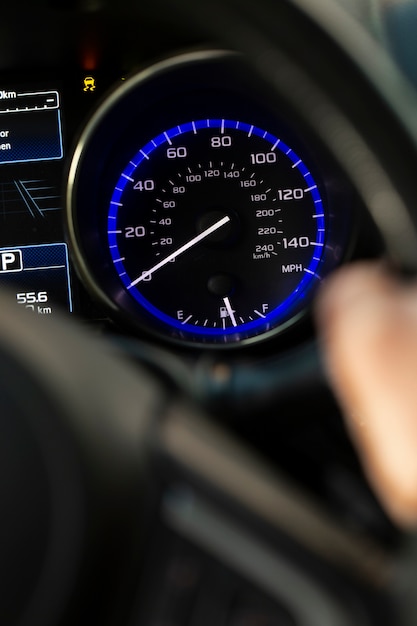 Close up on fuel level gauge in vehicle