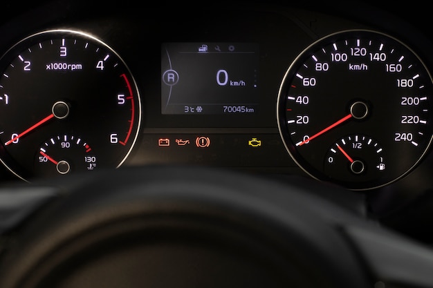 Close up on fuel level gauge in vehicle