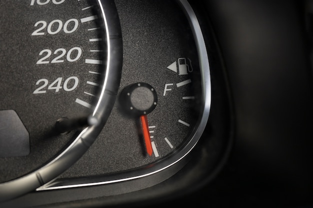 Close up on fuel level gauge in vehicle