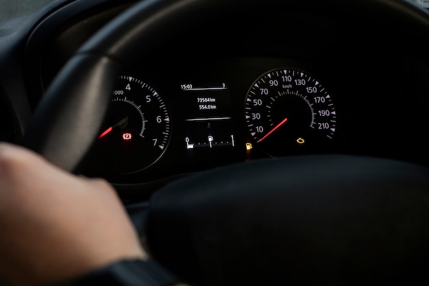 Close up on fuel level gauge in vehicle