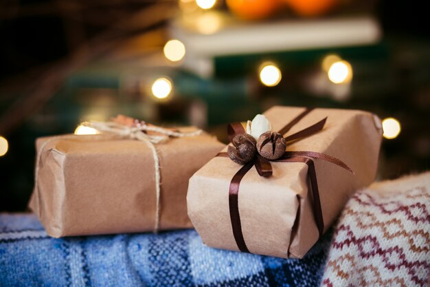 Close-up of gift with brown bow and adornments