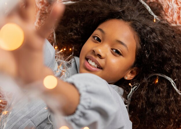 Close up girl posing with lights