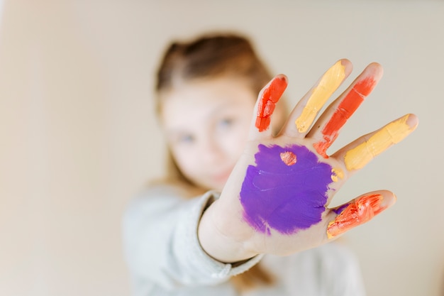 Close-up of a girl's painted hands