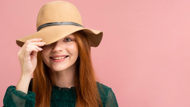 Free photo close-up girl wearing cute hat