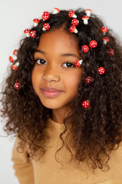 Free photo close up girl wearing little mushrooms