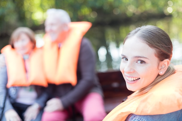 Free Photo close-up of girl with a ponytail and life jacket