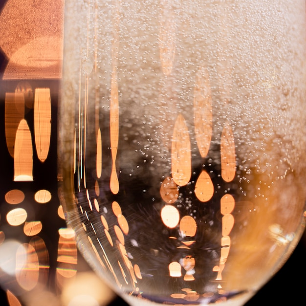 Close-up glasses with champagne bubbles