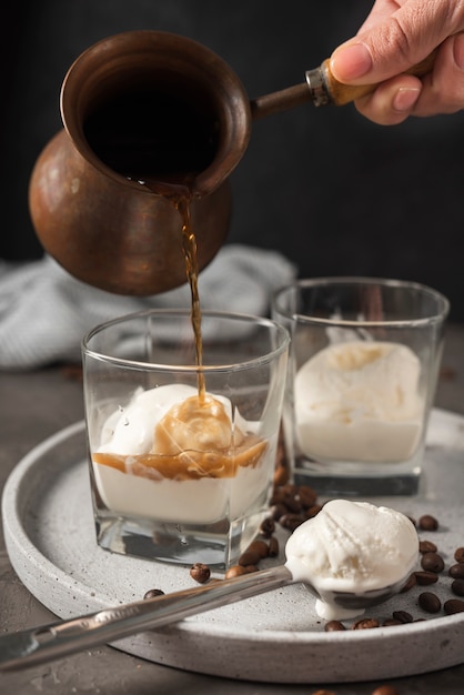 Free Photo close-up glasses with ice cream and coffee