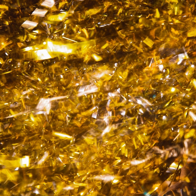 Free photo close-up golden confetti for new year anniversary