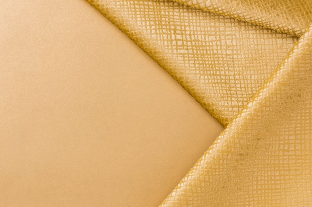 Free photo close-up golden fiber texture with copy space