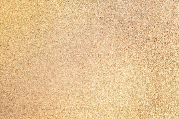 Free photo close up of golden glitter textured background