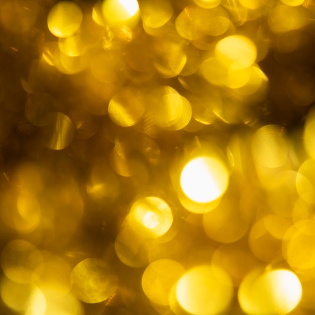 Free Photo close-up golden sparkle lights