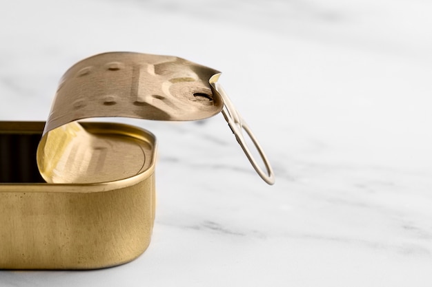 Close-up golden tin can on kitchen counter