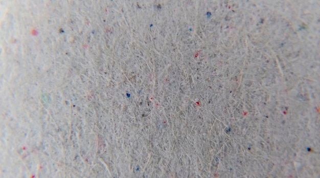 Free Photo a close up of a gray paper with blue and red dots.