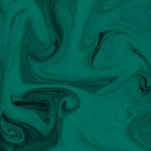 Free photo close-up of green and black paint flow background