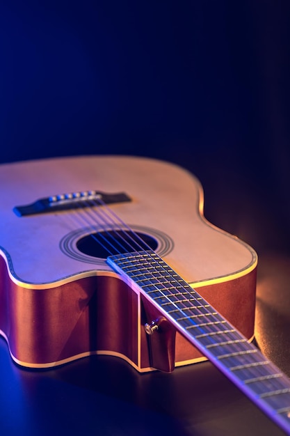 Close up of guitar and strings with shallow depth of field soft focus