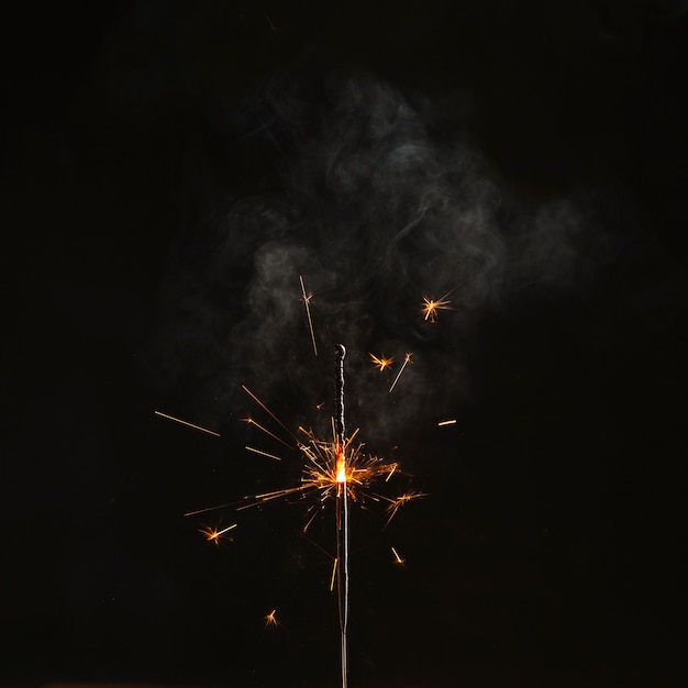 Free Photo close-up half-burnt sparkler