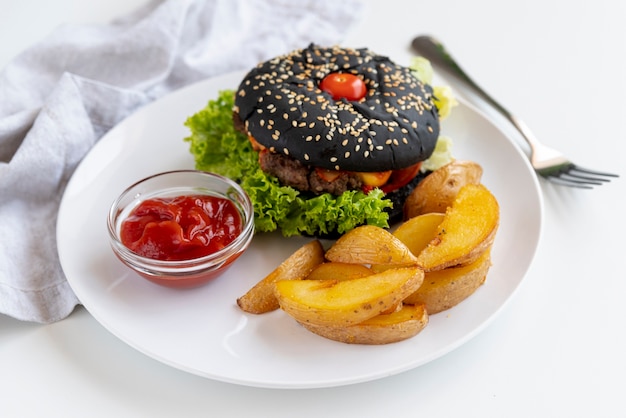 Close-up hamburger with fries