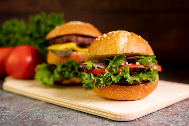 Close-up hamburgers on cutting board