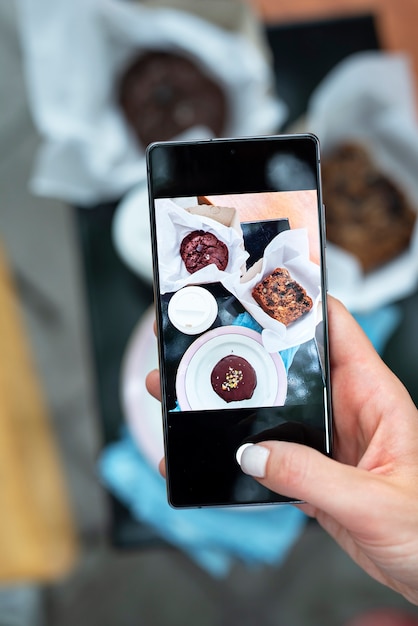 Free Photo close up hand holding dessert photos