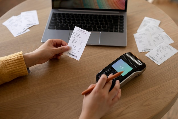 Close up hand holding receipt