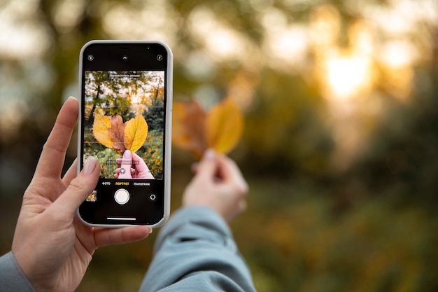 Close up hand holding smartphone