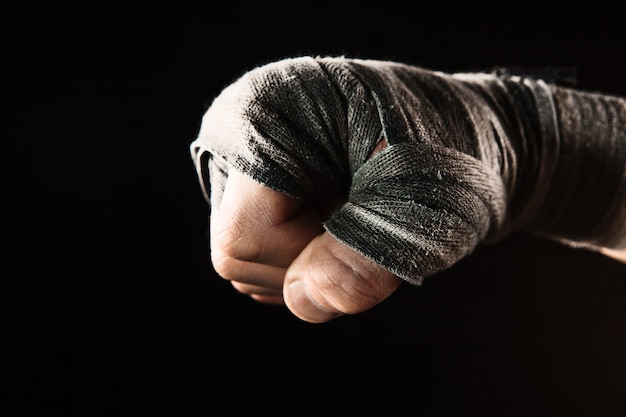 Close-up hand of muscular man with bandage