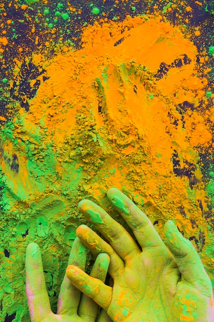 Free Photo close-up of hand painted with holi color powder