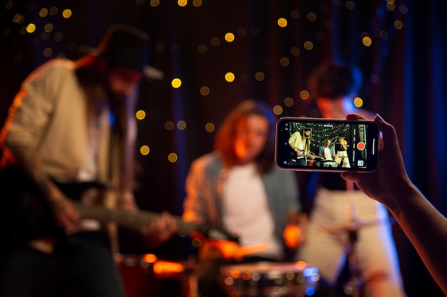 Free Photo close up hand recording concert