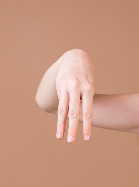 Free Photo close up of a hand teaching sign language