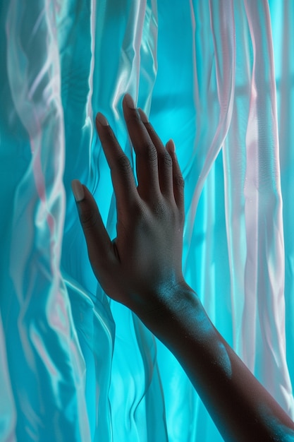 Close up on hand touching curtain