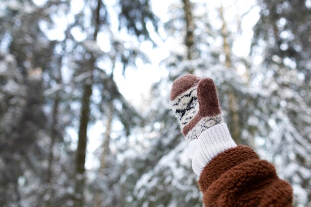 Close up hand wearing warm glove