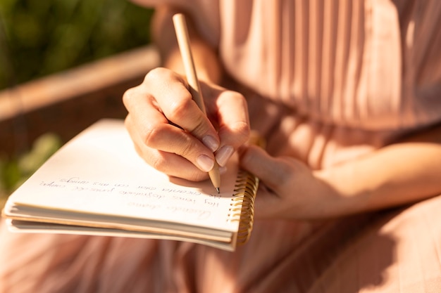 Close up hand writing on notebook