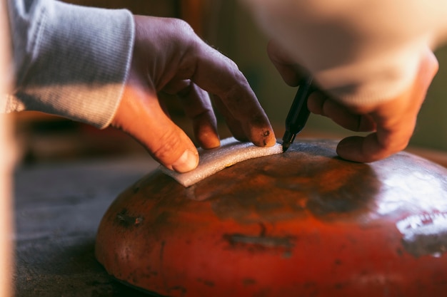 Close-up hands doing artisan work