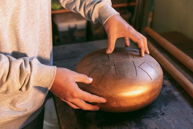 Close-up hands holding beautiful artisan item