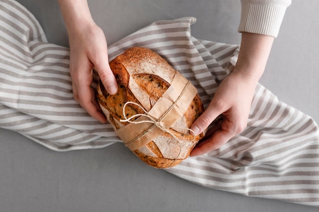 Close-up hands holding bread