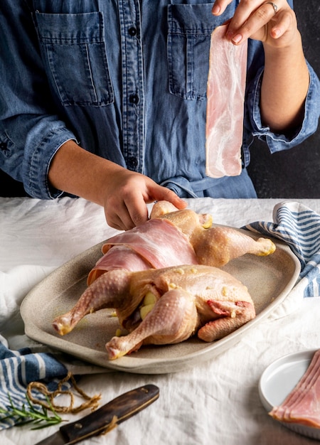 Close-up hands holding chicken