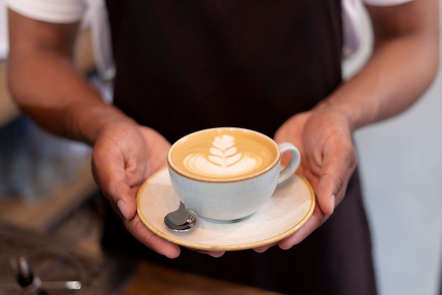 Close up hands holding coffee